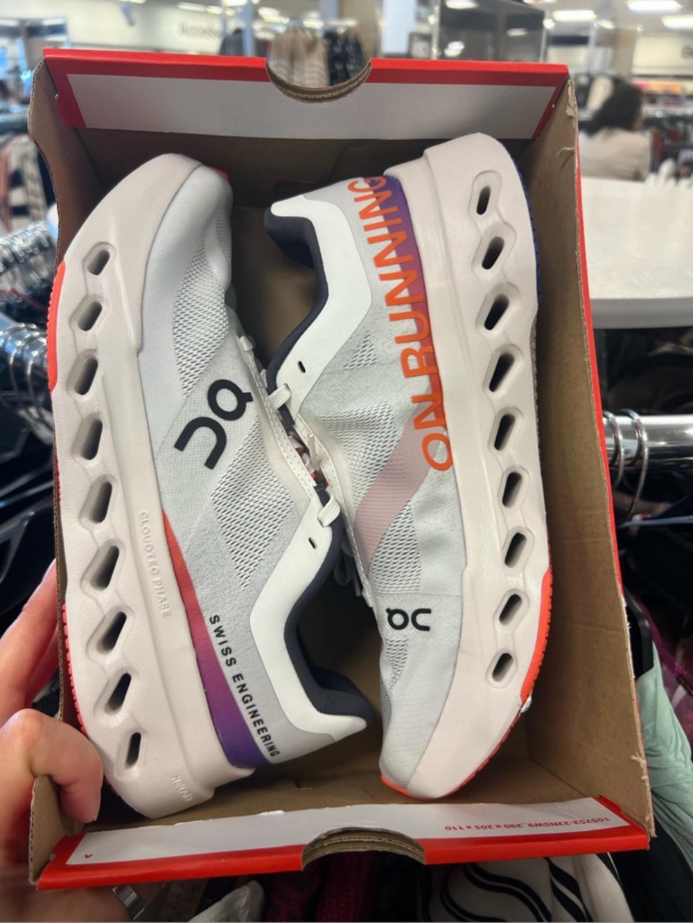 On Running Gray and White Performance Running Shoes with Orange Detail